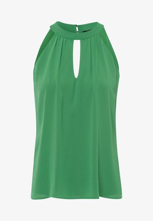 Blouse verte sans manches avec un col montant, présentant une petite découpe en forme de trou de serrure à l'avant et des détails plissés près du col.
