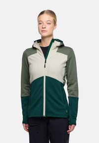 Hoodie in Hellgrün, Dunkelgrün und Beige. Mit Reißverschluss, strukturiertem Stoff und seitlichen Taschen. Leicht und tailliert.