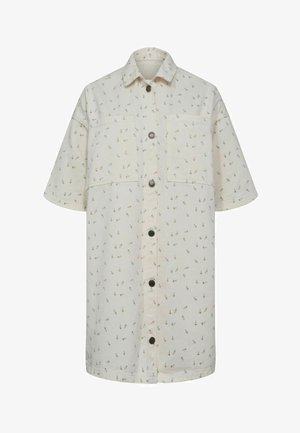 Licht beige overhemd met korte mouwen en knopen, met kleine donkere ankerprints en twee borstzakken.