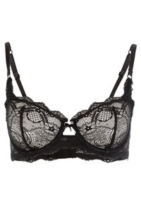 Reggiseno con ferretti in pizzo nero che presenta intricati motivi floreali, spalline regolabili e un dettaglio a fiocco decorativo al centro.