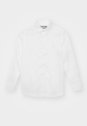 Langærmet hvid skjorte med knapper, krave, manchetter og synligt mærkelabel på indersiden af kraven.