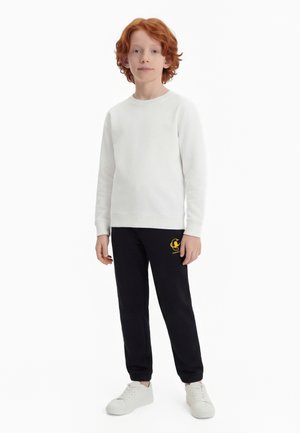 Champion GRAPHIC ELASTIC CUFF - Παντελόνι φόρμας - black