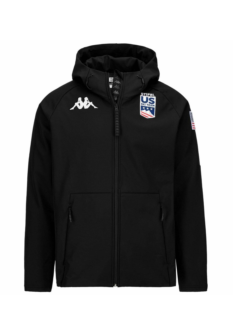 Giacca da sci nera con cappuccio, caratterizzata da una cerniera completa, due tasche laterali, logo Kappa sul petto e patch della U.S. Ski Team sul lato sinistro.
