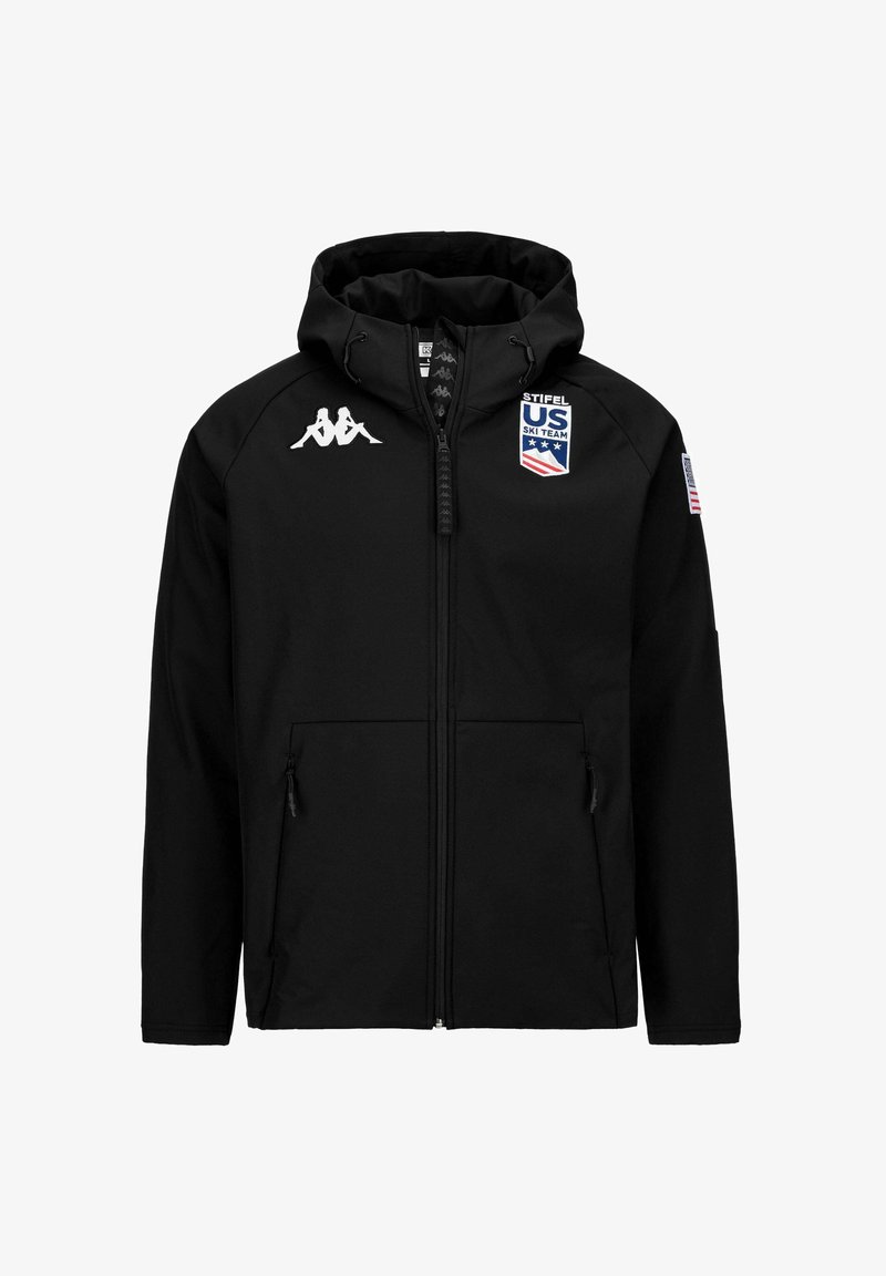 Giacca da sci nera con cappuccio, caratterizzata da una cerniera completa, due tasche laterali, logo Kappa sul petto e patch della U.S. Ski Team sul lato sinistro.