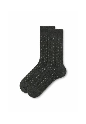 Par de calcetines de caña corta de color gris oscuro con pequeños lunares de color claro distribuidos de manera uniforme por toda la tela.