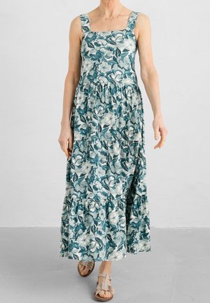 Blumiges Maxikleid in Teal und Creme mit quadratischem Ausschnitt, breiten Trägern und gestuftem Saum. Hergestellt aus leichtem Stoff, mit einem botanischen Druck.