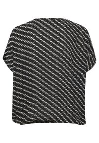 Blouse noire à manches courtes avec un motif abstrait en boucle blanche répétée, coupe ample et encolure arrondie.