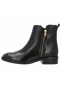 Botín de cuero negro hasta el tobillo con cremallera lateral, herrajes dorados, punta redondeada y tacón bajo apilado. Textura suave y marca minimalista.