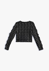 Top corto nero a maniche lunghe con motivo a stelle in argento. Tessuto morbido con design aderente e dettaglio arricciato sulle maniche.