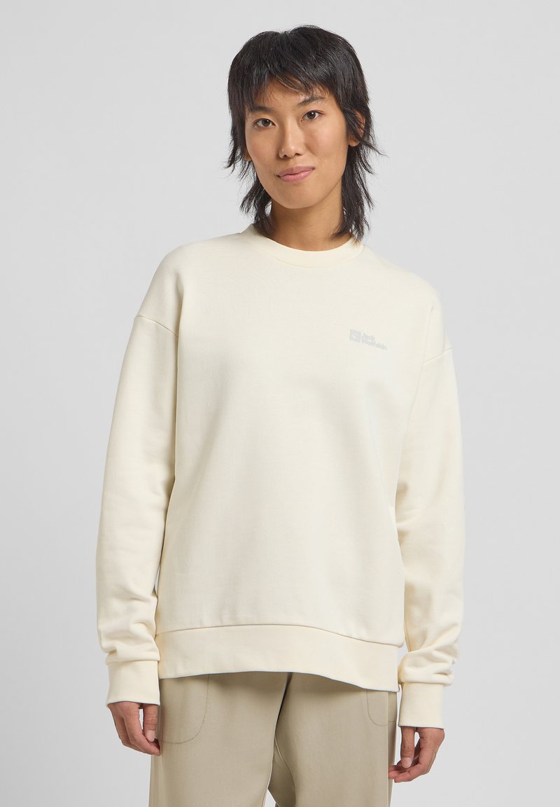 Felpa color crema con girocollo e maniche lunghe. Presenta una vestibilità comoda e un piccolo logo sul petto. Texture liscia.