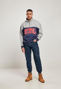 Southpole WITH CARGO POCKETS - Jeans Relaxed Fit - indigo raw