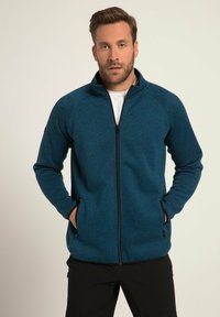 Herren-Zip-Jacke in Dunkeltürkis, aus strukturiertem Stoff, mit hohem Kragen, zwei vorderen Reißverschlusstaschen und Raglanärmeln.
