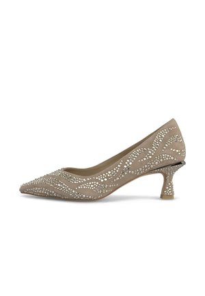 Beige pointed-toe pump with a low heel, adorned with wavy patterns of clear rhinestones, featuring a smooth suede-like texture.