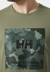 Helly Hansen CORE  ciemnozielony