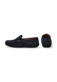 Sorte læder slip-on loafers med en glat tekstur, kontrasterende syninger og en fleksibel gummisål. Ingen synlige logoer eller udsmykninger.
