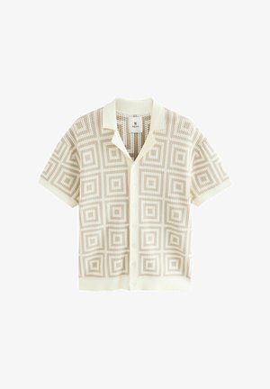 Short-sleeve beige button-up shirt with geometric square pattern and a fold-over collar, made from lightweight knit fabric.