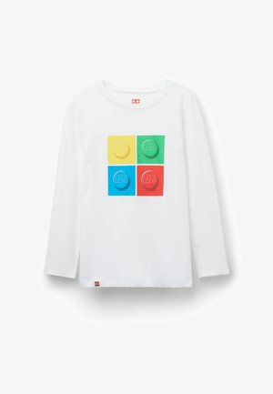 Weißes Langarmshirt mit vier großen LEGO-Noppen in den Farben Gelb, Grün, Blau und Rot, die vorne zu einem Quadrat angeordnet sind.