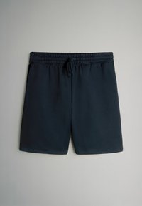 Donker marineblauwe shorts van zacht materiaal, met een elastische tailleband en drawstring. Eenvoudig ontwerp, zonder zakken of versieringen.
