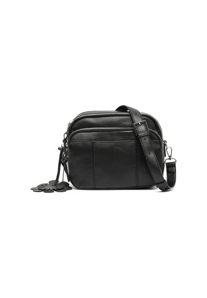 Black leather crossbody bag with adjustable strap, two zippered compartments, front pocket, and decorative flower-shaped leather charm.