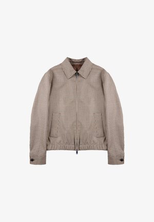 Braun- und cremefarbener kariierter Jacke mit Reißverschluss vorne, Kragen, elastischem Bund und geknöpften Manschetten; glatte Textiloberfläche.