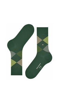 Zielone bawełniane skarpetki z wzorem argyle w różnych odcieniach zieleni i beżu, z żółtymi detalami szycia i logo na podeszwie.