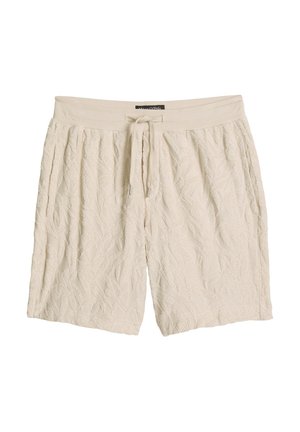 Beige strukturierte Shorts mit elastischem Bund und Kordelzug, für lässiges Tragen und Komfort entwickelt.