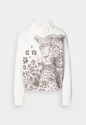 White sweatshirt with a ruffled collar, featuring a leopard graphic in shades of gray and patterned details on the front. Long sleeves.
