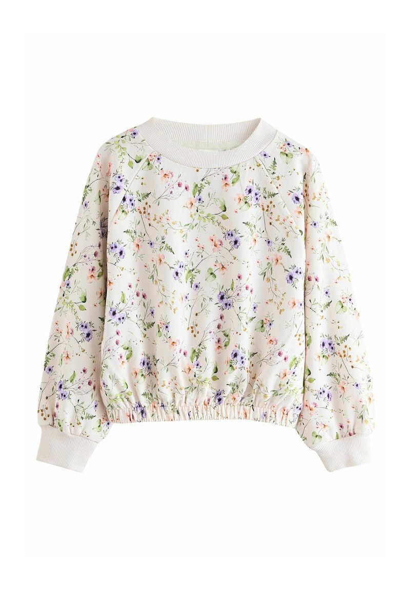 Blommig sweatshirt med vit bas, prydd med flerfärgade blommor i lila, rosa och grönt. Elastisk midja och ärmslut, rundhalsad design.
