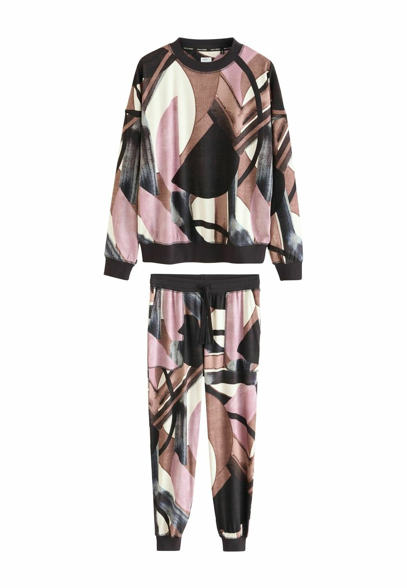 Multi-colored sweatshirt and pants set featuring abstract shapes in pink, black, and cream, made of soft fabric with ribbed cuffs.