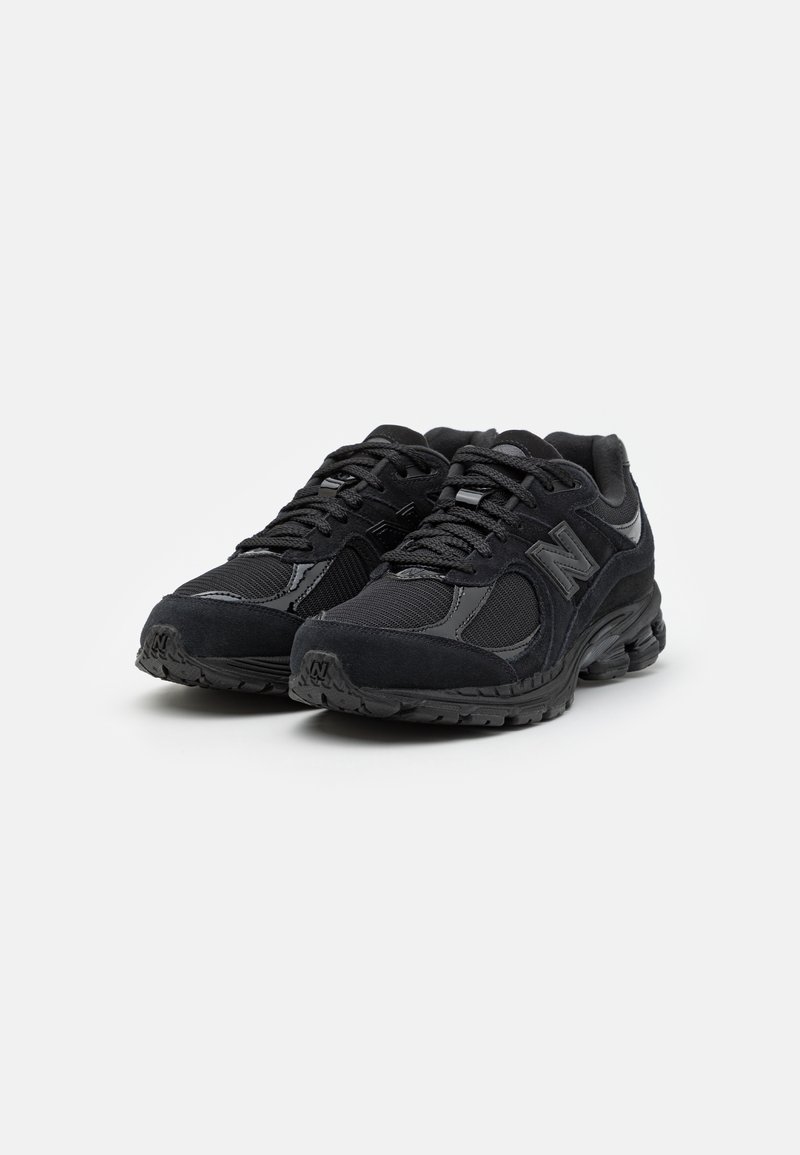 New Balance M2002 UNISEX - Sneaker low - black/schwarz - Zalando.de
