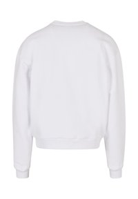 Hvid sweatshirt, i bomuldsstof, afslappet pasform, rund halsudskæring, dropped skuldre, manchetterede lange ærmer og ribbet kant.
