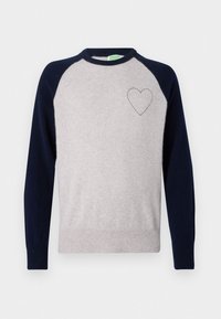 Light gray knit sweater with navy blue raglan sleeves, round neckline, and a small embroidered heart on the left chest. Cotton blend material.