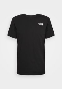 Camiseta negra de manga corta con cuello redondo y pequeño logo blanco de "The North Face" en la parte superior izquierda del pecho.