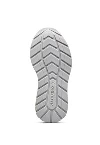 Bílá gumová podrážka boty se zoubkovaným vzorem, označená "NATURINO" a velikostí "25." Texturovaný povrch pro lepší přilnavost a stabilitu.