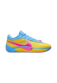 Scarpe da ginnastica di un luminoso colore giallo con accenti blu. Presentano una parte superiore texturizzata, il logo swoosh rosa e una suola a motivi. Design con lacci.