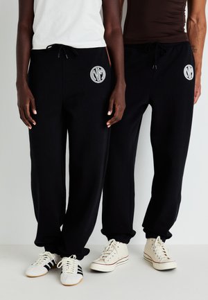 NMMILES PANT UNISEX - Pantalon de survêtement - black/white