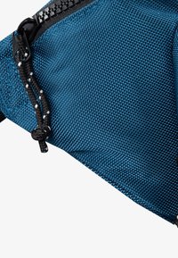 Blue nylon fabric with a textured finish, featuring black hardware, a zipper, and a braided drawstring with white accents.