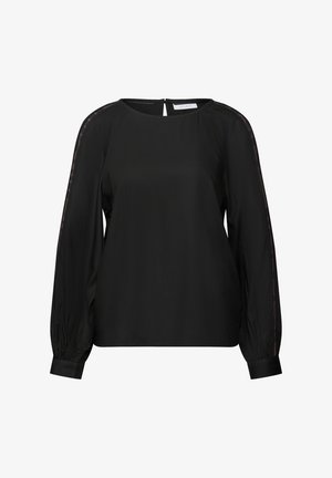 Zwarte blouse met een ronde halslijn, lange mouwen en een sleuf achter. Bevat transparante accenten langs de schouders en elastische manchetten.