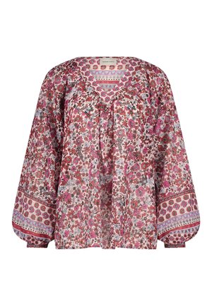 Blouse ample à manches longues avec imprimé floral rose, rouge et blanc et bordures à motifs aux poignets et à l'encolure.