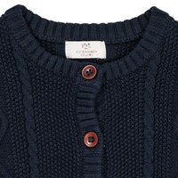 Cárdigan de punto azul marino con un patrón texturizado, cuello redondo y dos botones marrones. La etiqueta dice "Copenhagen Colors."