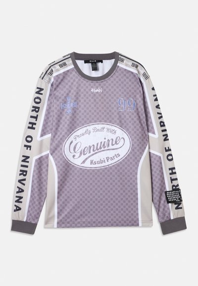 Long-sleeve shirt in light gray featuring checkerboard pattern, white accents, graphic print, and text "North of Nirvana" on sleeve.