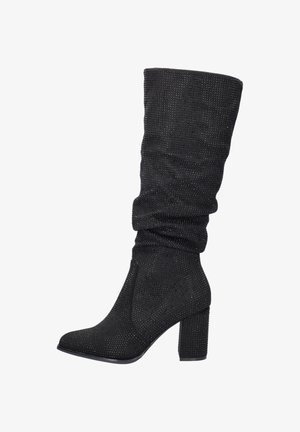 Black knee-high boots made of textured fabric with a slouched design. Features a square toe and a chunky heel, embellished with metallic accents.