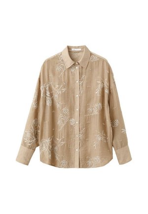 Chemise beige à manches longues boutonnée avec col, ornée d'une broderie florale blanche et de larges poignets.