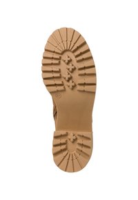 Semelle de chaussure en caoutchouc de couleur beige clair, présentant des motifs de semelle définis, des accents en forme d'étoile au centre et un bord lisse. Marquée de la taille 37.