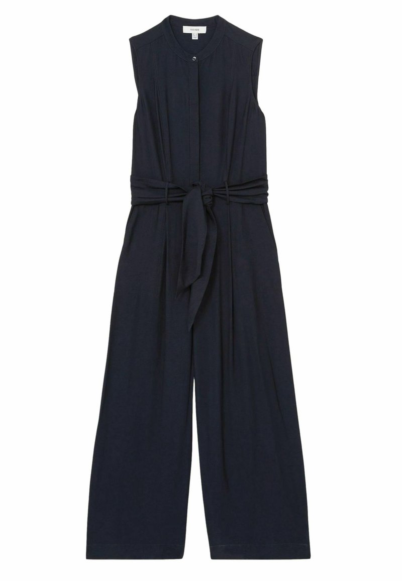 Marineblauwe mouwloze jumpsuit met knopen aan de voorkant, brede pijpen en een strikceintuur. Gemaakt van een soepele, lichtgewicht stof met een subtiele textuur.