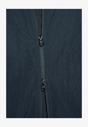 Next, EDIT PIPED LIGHTWEIGHT FUNNEL NECK WINDBREAKER JACKET - Übergangsjacke - black