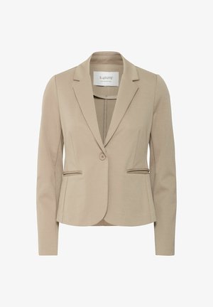 Beige zakó, amely testhezálló fazonú, egy gombos záródással, két elülső zsebbel és sima textúrával rendelkezik. Hajtókával és hosszú ujjal készült.