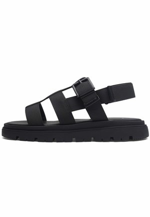 Sandalias planas negras de dedo con anillo | | New Collection SS26