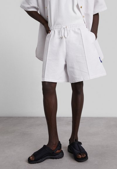 Nikolaj Storm CYRUS PIN UNISEX - Παντελόνι φόρμας - white