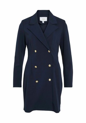 Rochie-blazer ajustată de culoare albastru marin, cu un design cu două rânduri de nasturi, având nasturi aurii și rever fasonat. Textură netedă, mâneci lungi.
